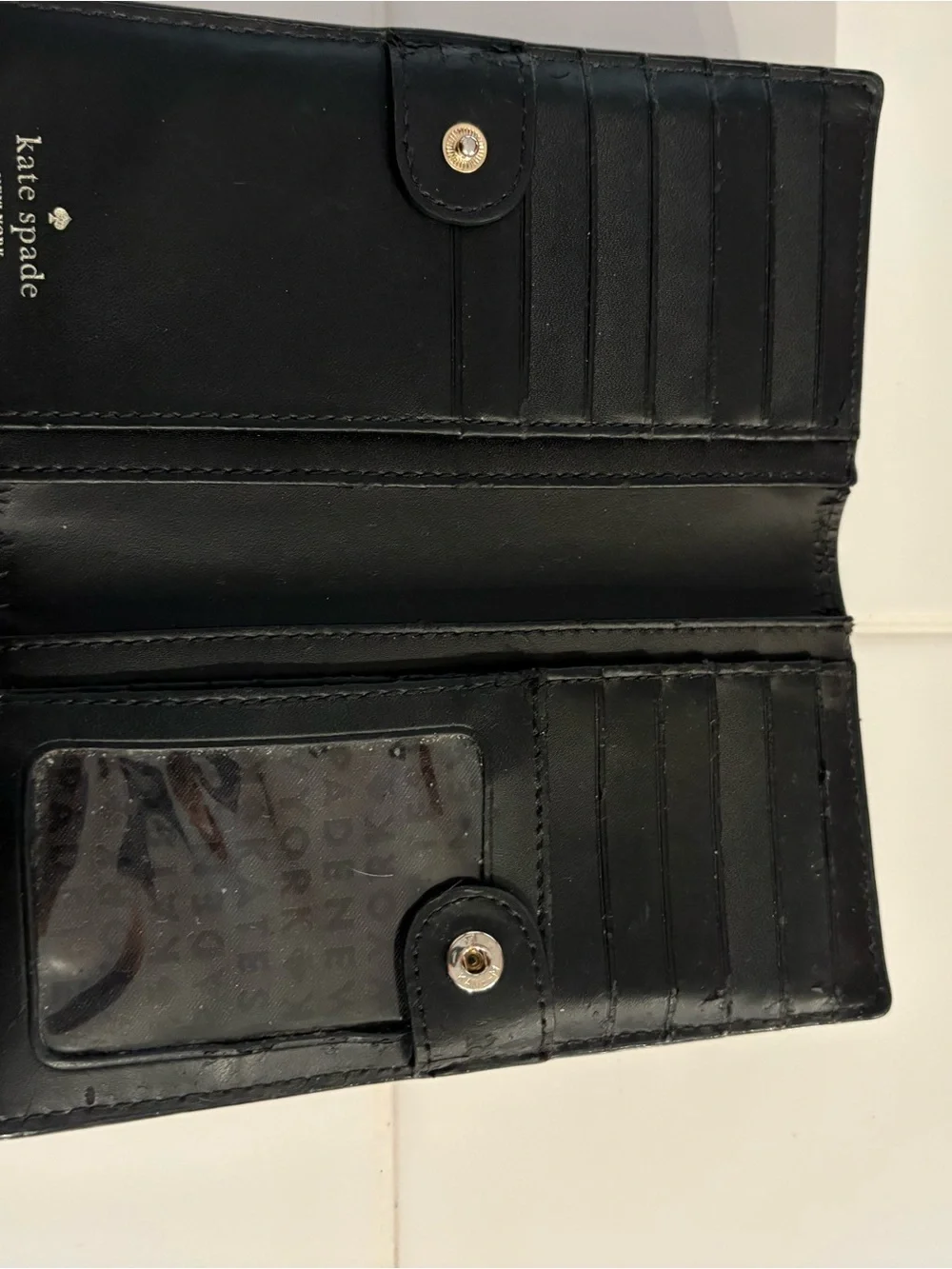 Kate Spade Black Pebbled Leather Wallet with Gold Plaque